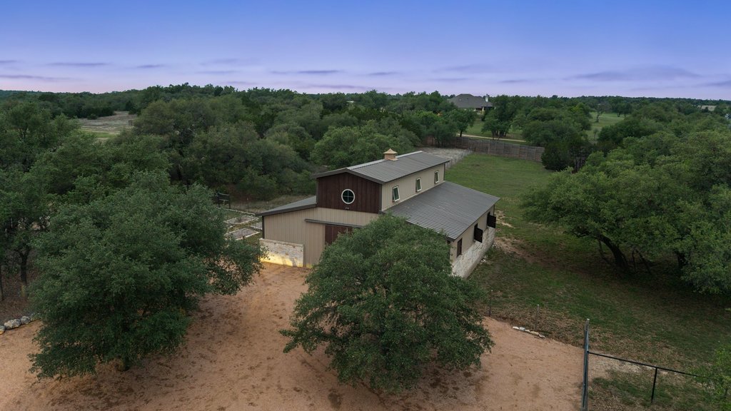 2560 Bell Springs Road Dripping Springs, TX 78620 - Photo 23 of 42 an aerial view of a house with mountain view