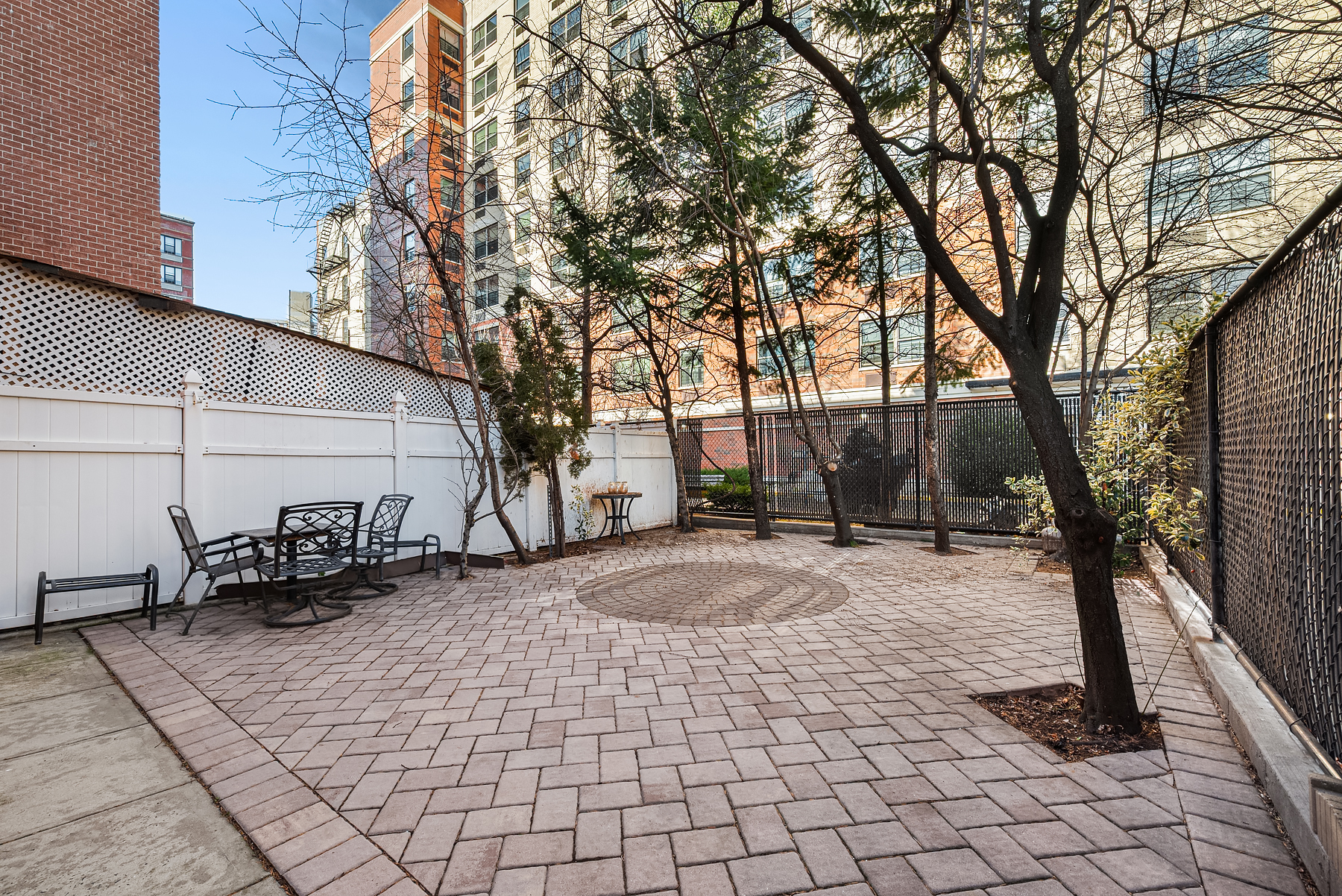 415 East 160th Street, Unit 1 Bronx, NY 10451 - Photo 15 of 16 a view of a backyard of the house