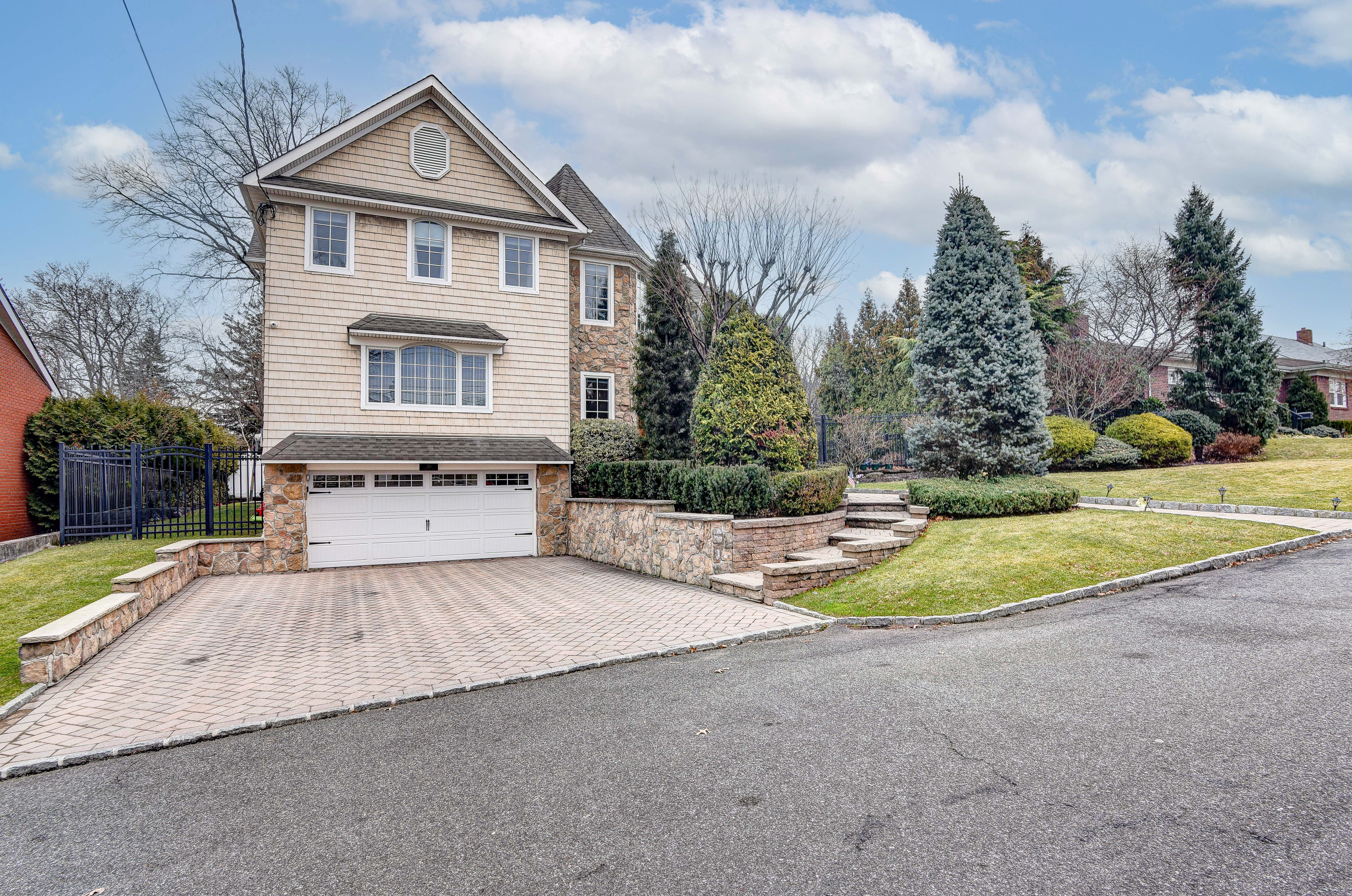 215 Lawrence Avenue Staten Island, NY 10310 - Photo 36 of 45 a view of a house with a yard