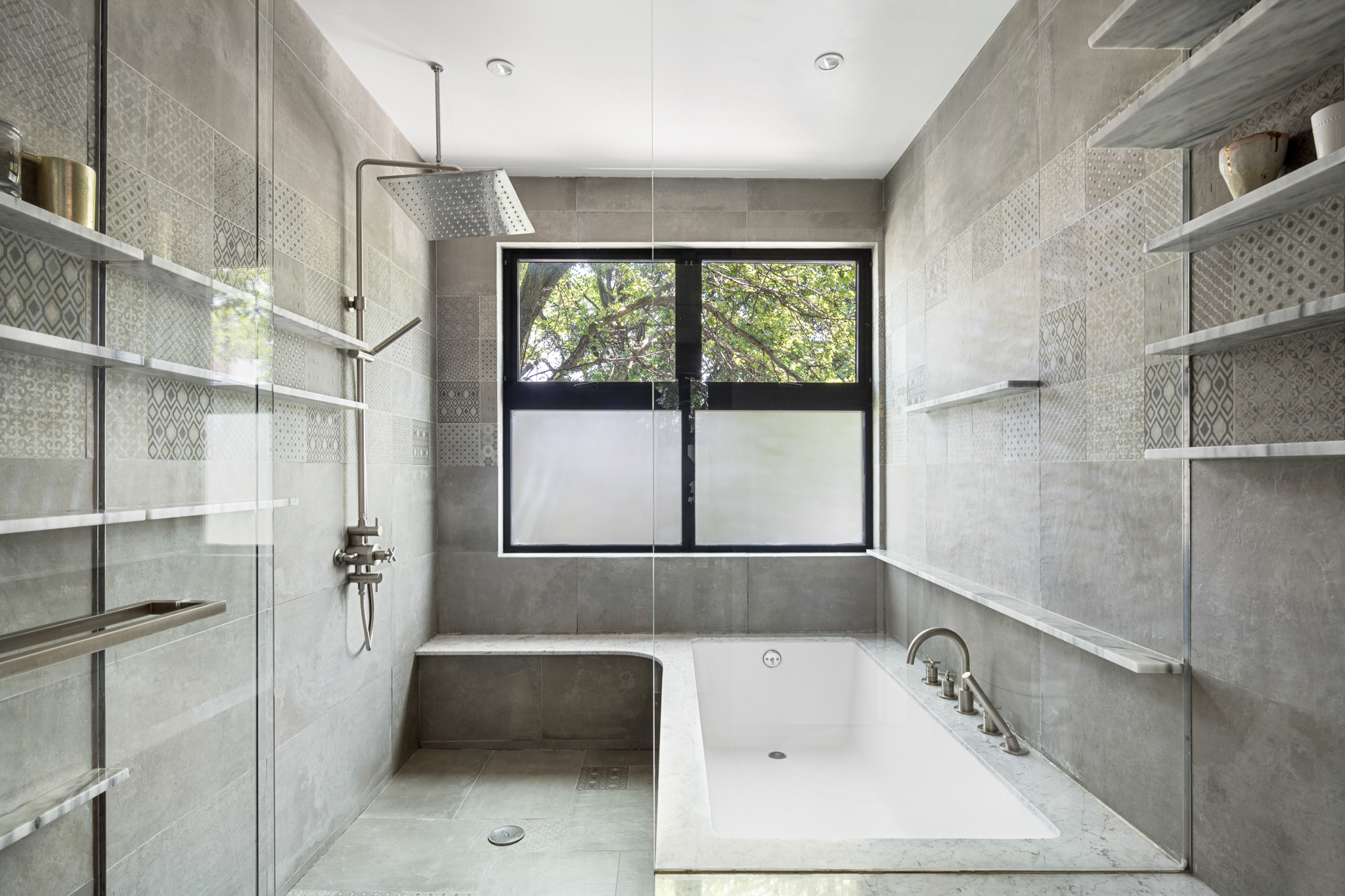 512 Lorimer Street Brooklyn, NY 11211 - Photo 20 of 22 a bathroom with a tub a window and a shower