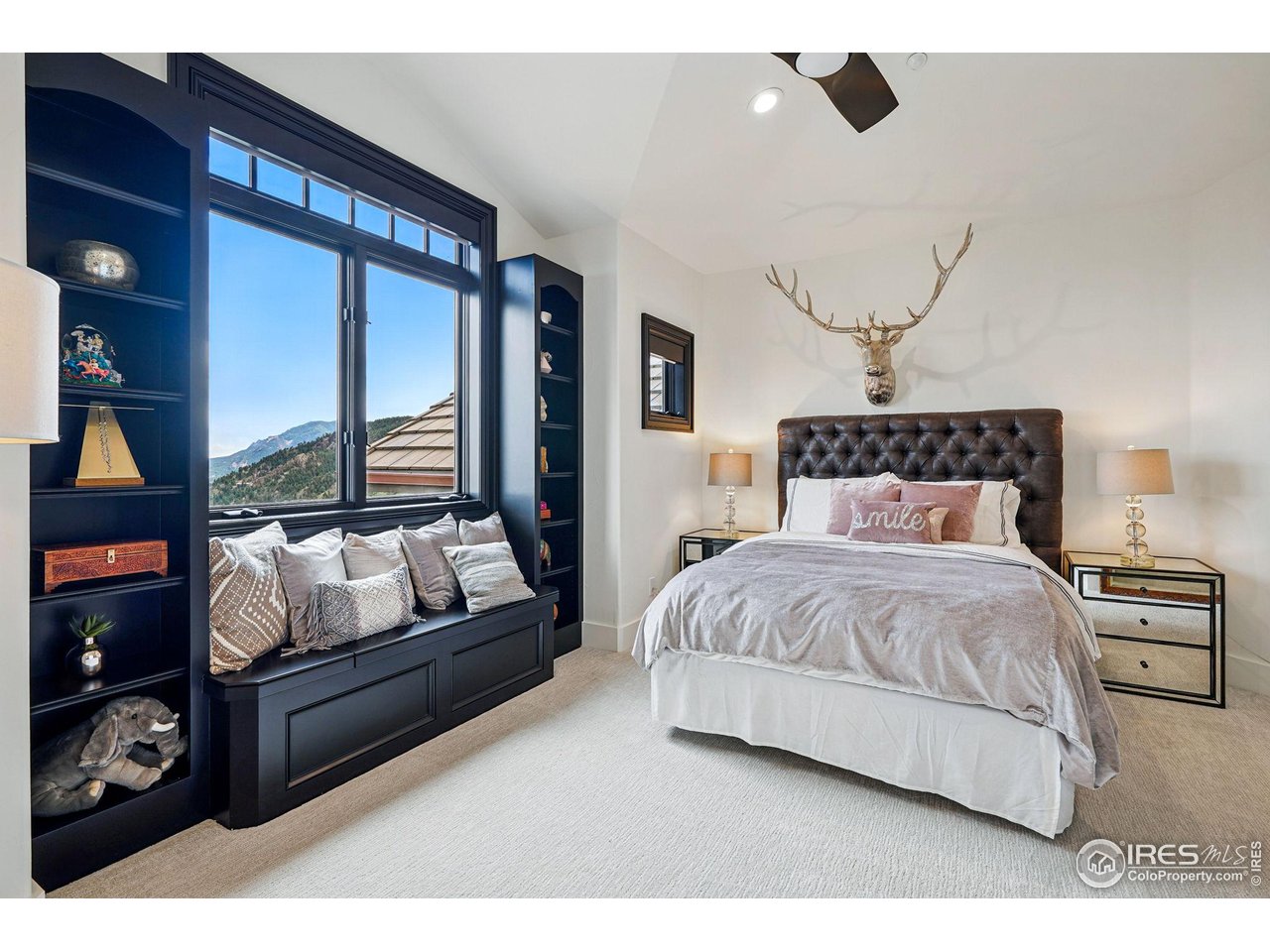 166 Valley View Way Boulder, CO 80304 - Photo 25 of 40 a bedroom with a bed window and couch