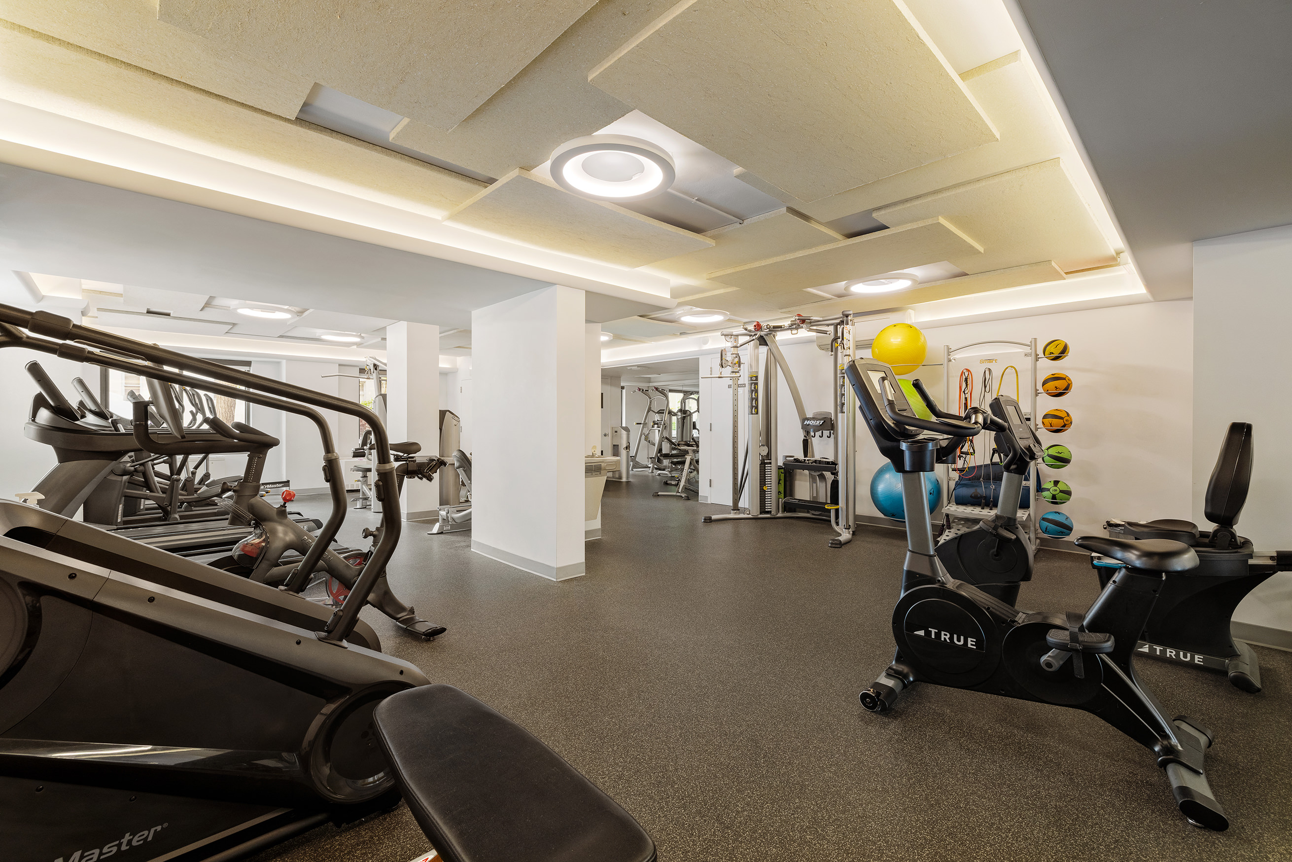10 East End Avenue, Unit 18D Manhattan, NY 10075 - Photo 18 of 21 a view of a room with gym equipment