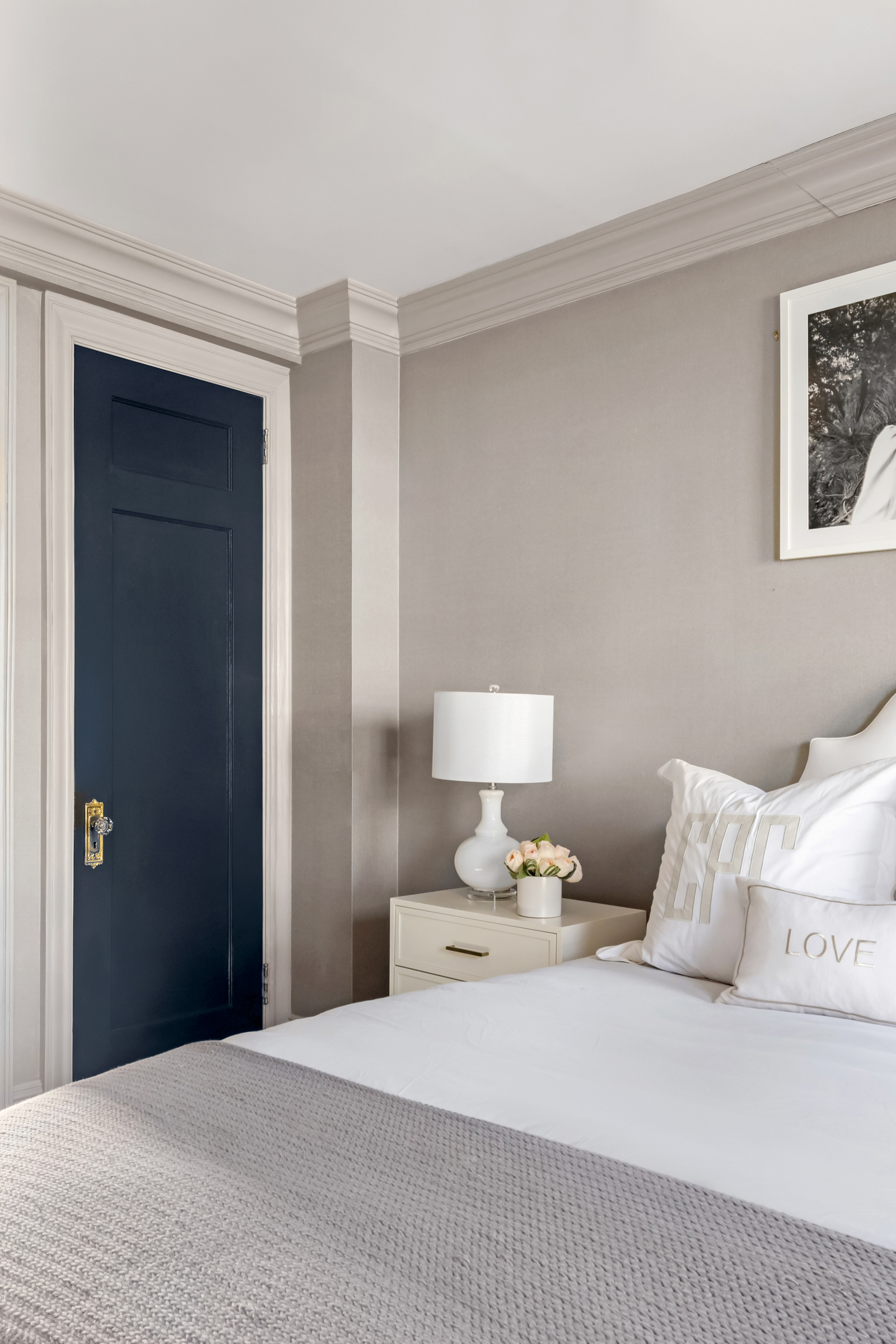 15 West 11th Street, Unit 9A Manhattan, NY 10011 - Photo 4 of 9 a bedroom with a bed and night stand