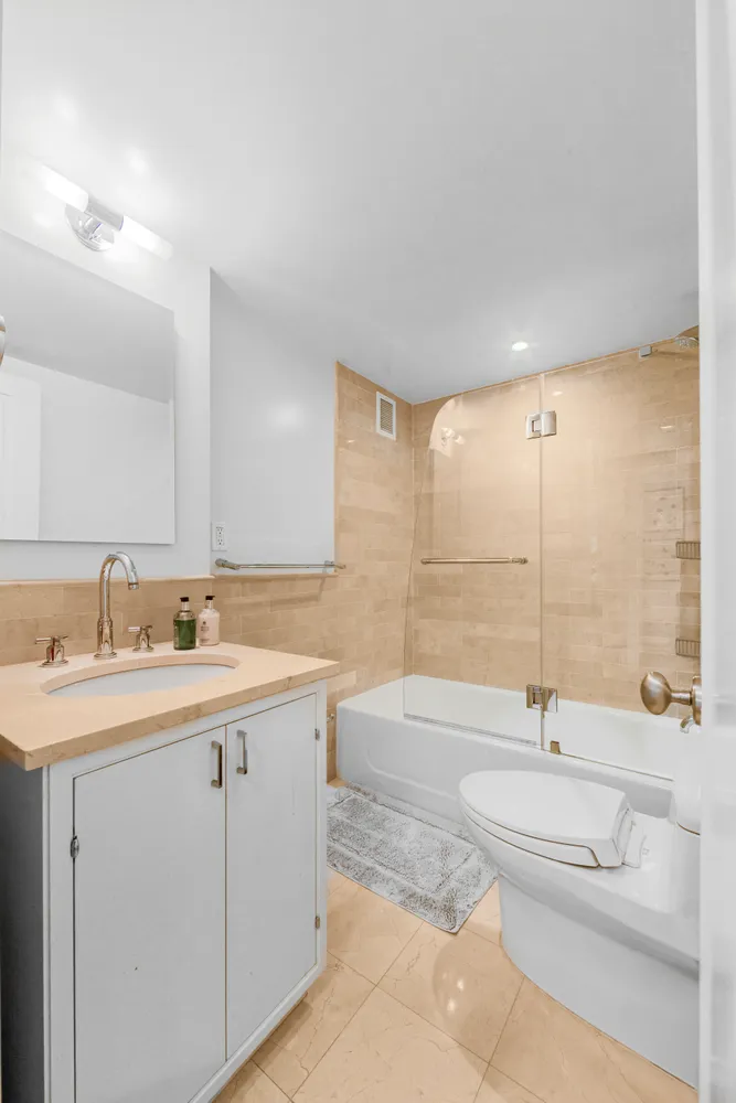 a bathroom with a sink and a bathtub