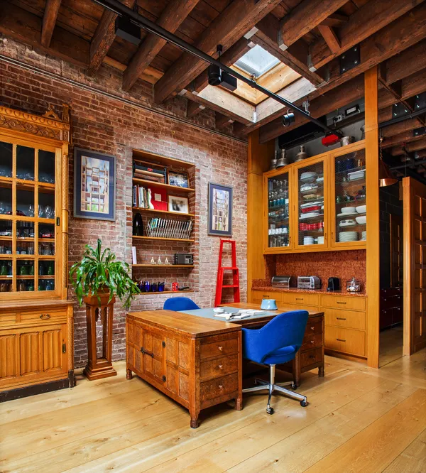 a view of a chairs and table in a room
