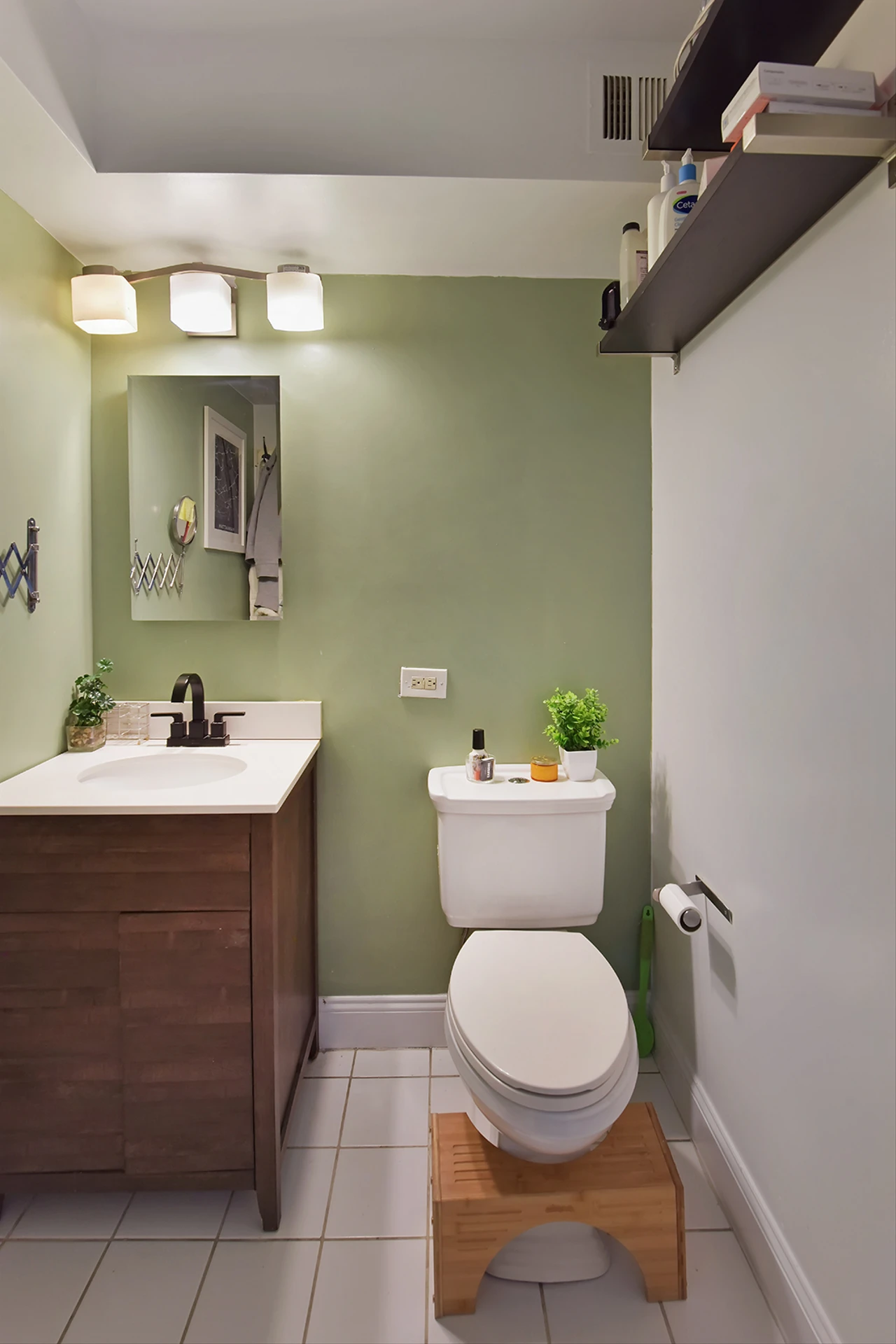 2235 Frederick Douglass Boulevard, Unit 2D Manhattan, NY 10027 - Photo 10 of 14 a bathroom with a sink mirror vanity and toilet