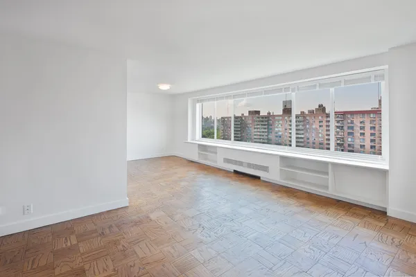an empty room with windows
