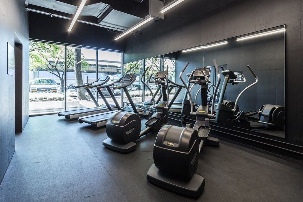 275 South Street, Unit 7PP Manhattan, NY 10002 - Photo 10 of 19 a view of a room with gym equipment