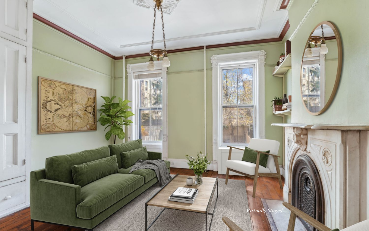 509 6th Avenue Brooklyn, NY 11215 - Photo 6 of 20 a living room with furniture a flat screen tv and a large window