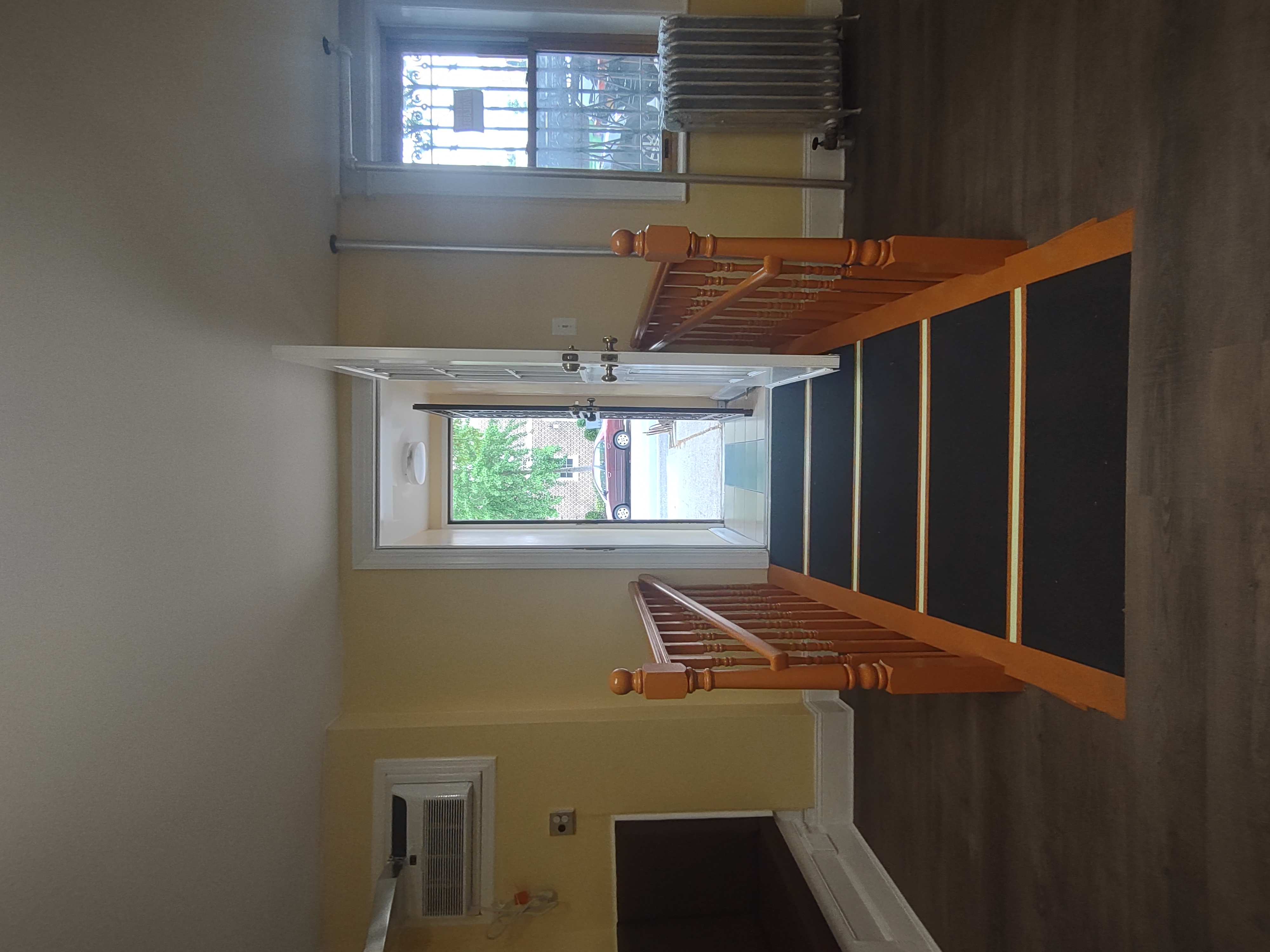 175 Fenimore Street Brooklyn, NY 11225 - Photo 4 of 11 a view of entryway and hall with wooden floor