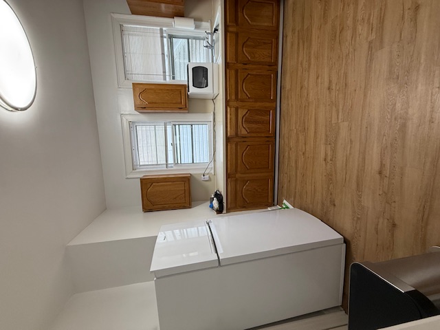 1587 East 18th Street, Unit 2 Brooklyn, NY 11230 - Photo 6 of 13 a view of kitchen with stainless steel appliances wooden floor and a refrigerator