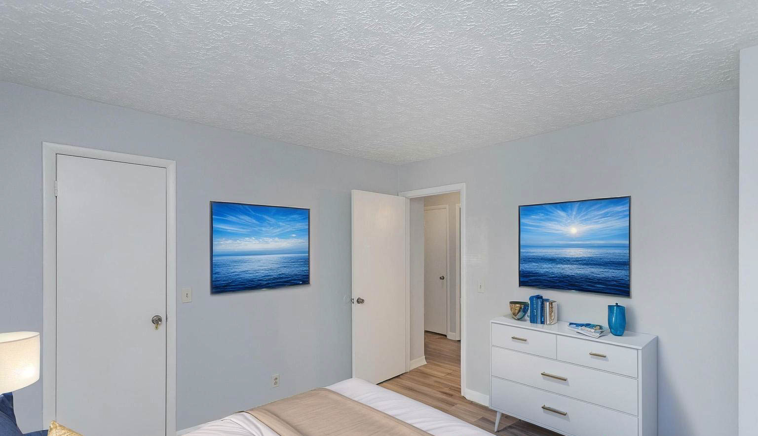 Falls Creek Drive, Unit 3307 & 3309 Nashville, TN 37214 - Photo 39 of 51 a bedroom with a bed and a dresser in it