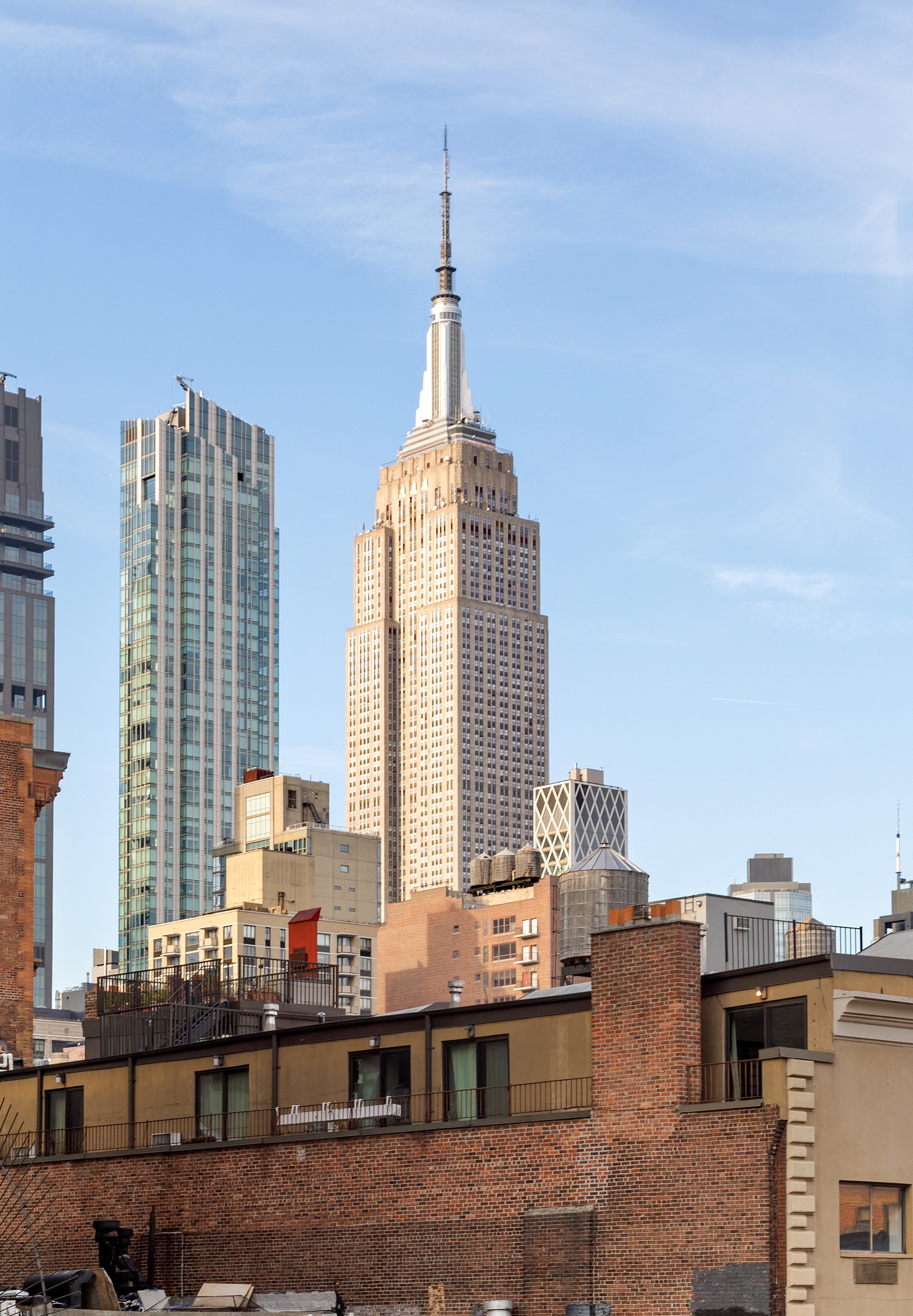 201 East 25th Street, Unit 7F Manhattan, NY 10010 - Photo 6 of 10 a front view of a building with outdoor seating