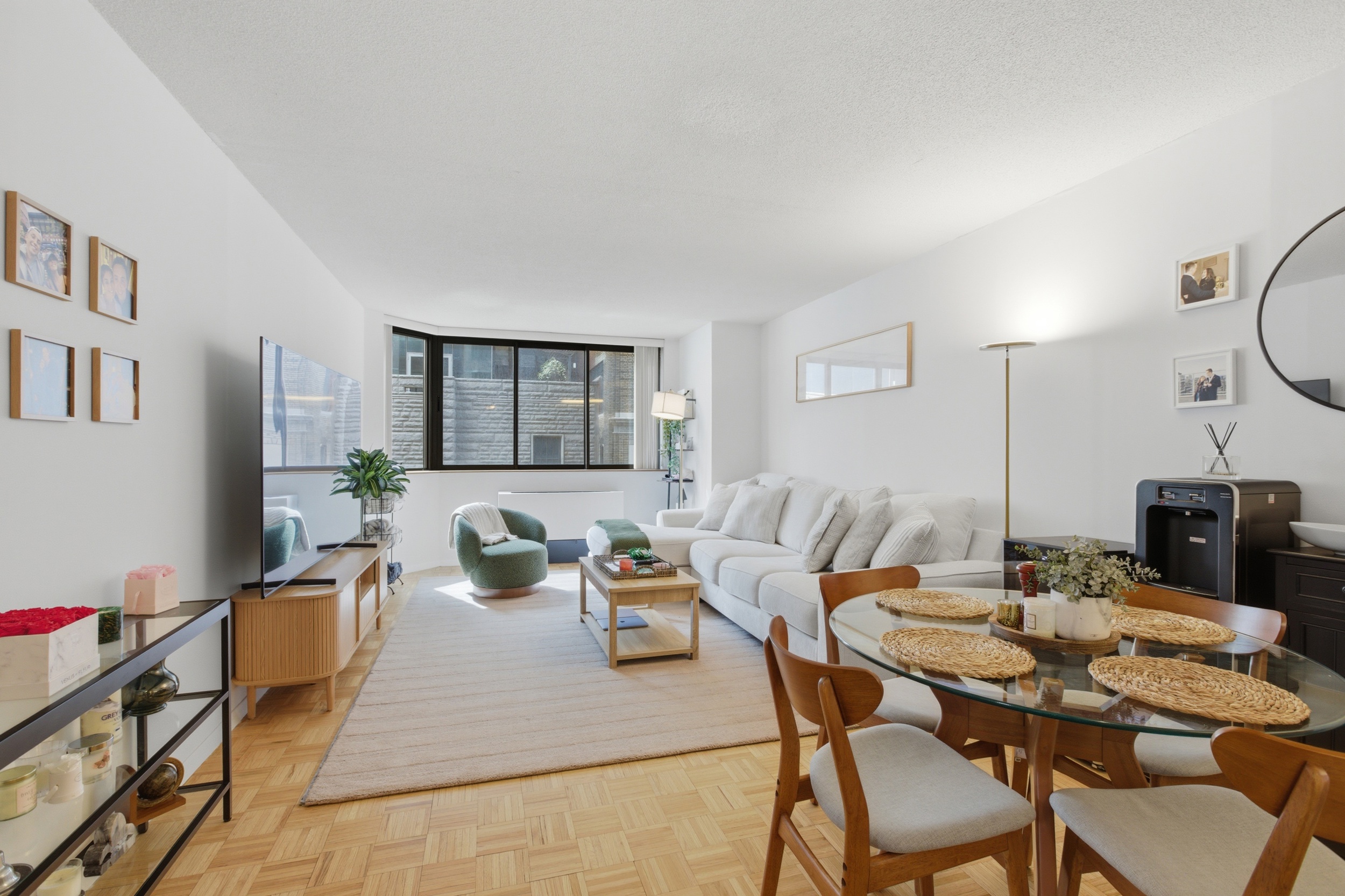 280 Park Avenue South, Unit 5L Manhattan, NY 10010 - Photo 1 of 17 a view of a dining room with furniture