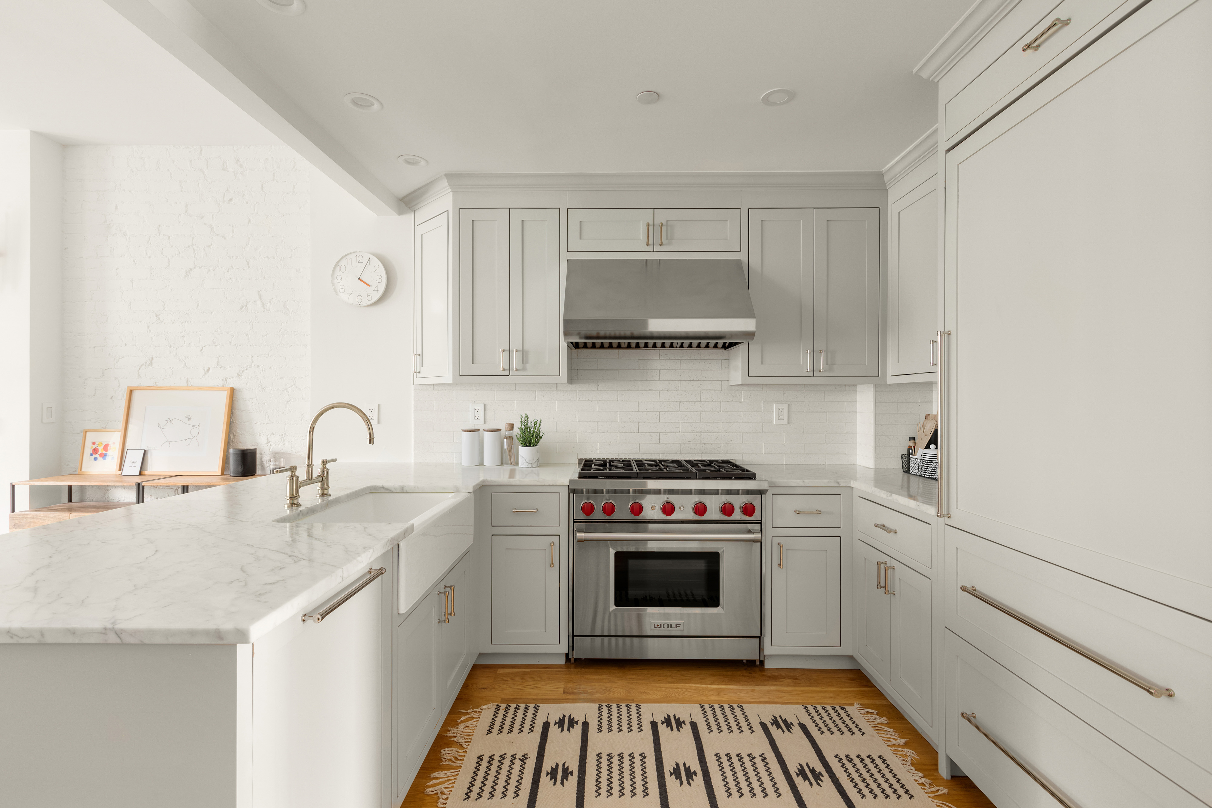 352 6th Avenue, Unit 3 Brooklyn, NY 11215 - Photo 7 of 14 a kitchen with a stove sink and a granite counter tops