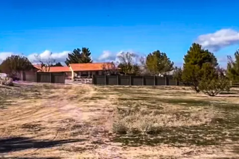 a view of swimming pool with an outdoor space and seating area