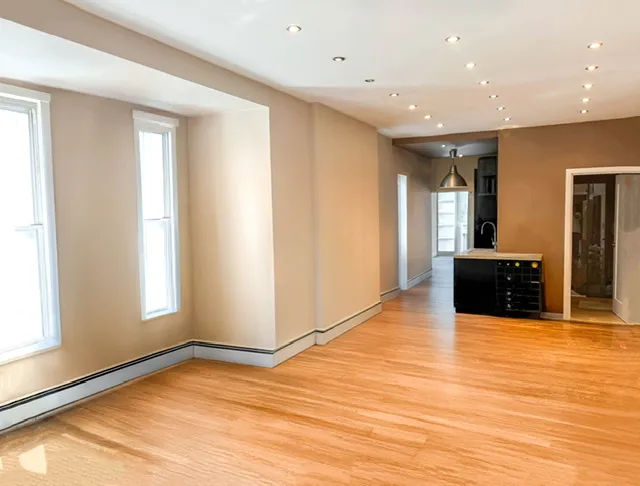 a view of a kitchen with a sink