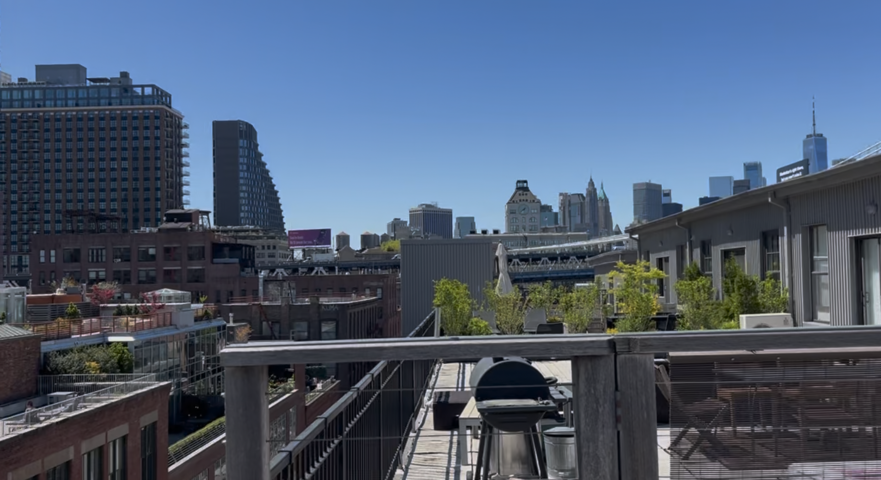 50 Bridge Street, Unit 401 Brooklyn, NY 11201 - Photo 10 of 12 a view of a balcony with two chairs and a table