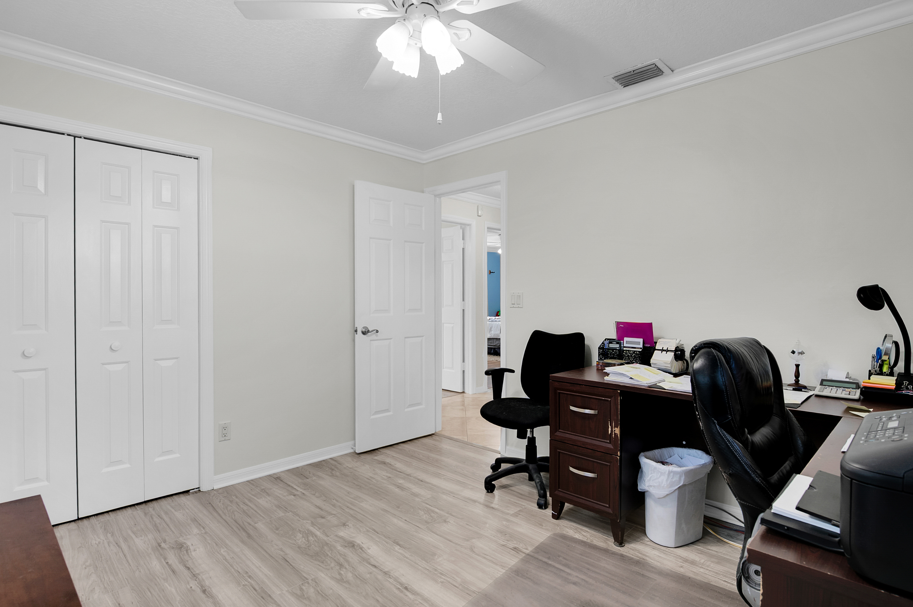 1560 Southwest 16th Street Boca Raton, FL 33486 - Photo 51 of 72 a view of a workspace with furniture and a window