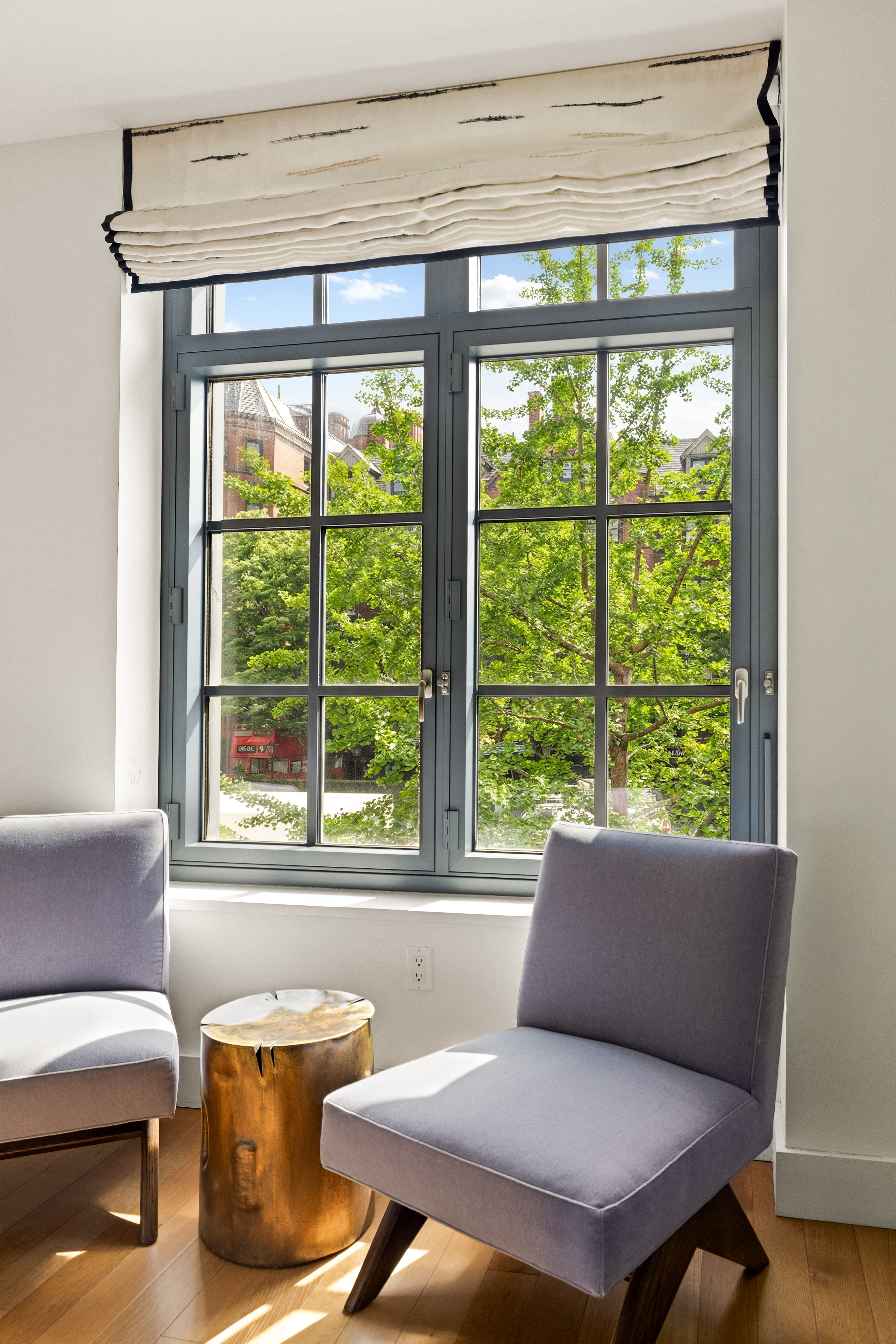 500 West 21st Street, Unit 2G Manhattan, NY 10011 - Photo 7 of 21 a living room with furniture and a window