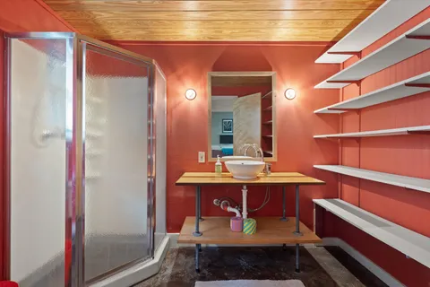 a room with a table and chairs in it