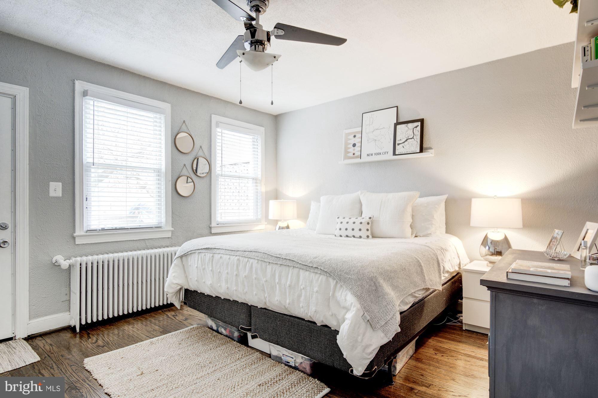 731 13th Street Northeast Washington, DC 20002 - Photo 21 of 43 a bedroom with bed and window