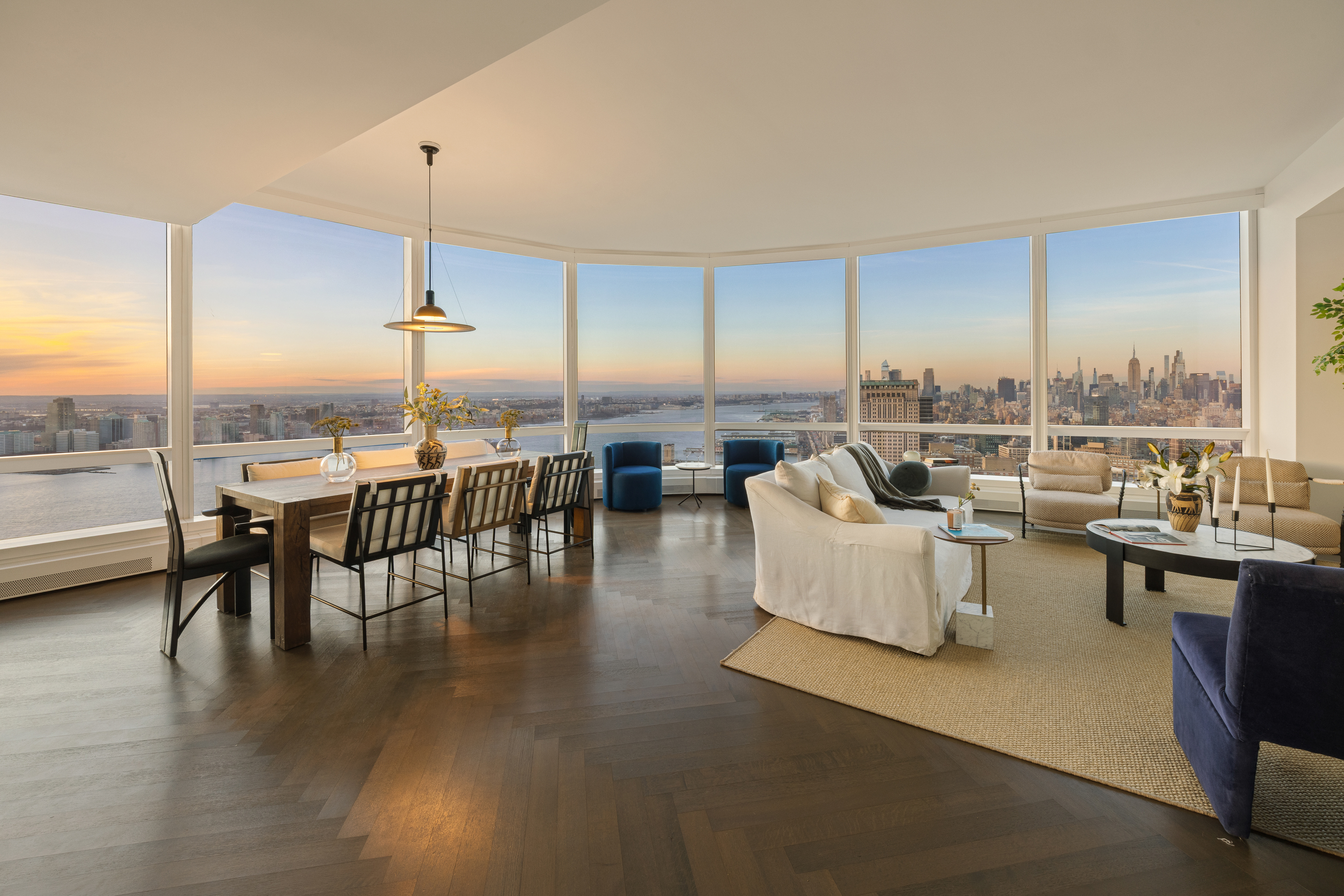 111 Murray Street, Unit 49W Manhattan, NY 10007 - Photo 2 of 36 a dining room with furniture window and wooden floor