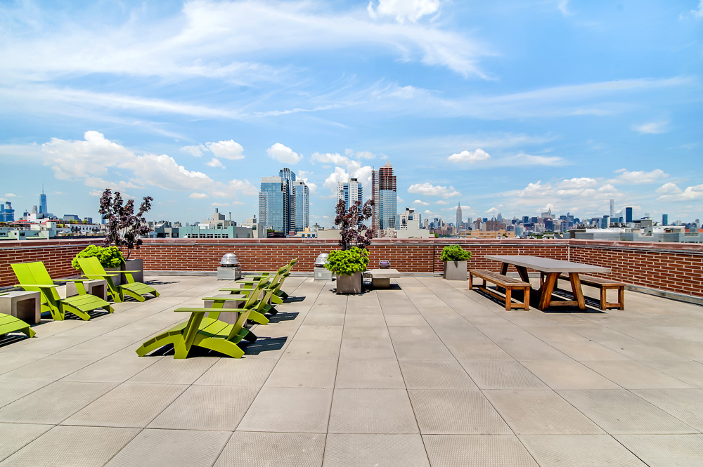 142 North 6th Street, Unit 3B Brooklyn, NY 11249 - Photo 5 of 7 a view of a terrace with chairs