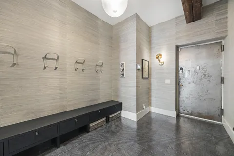 a bathroom with a shower and a sink