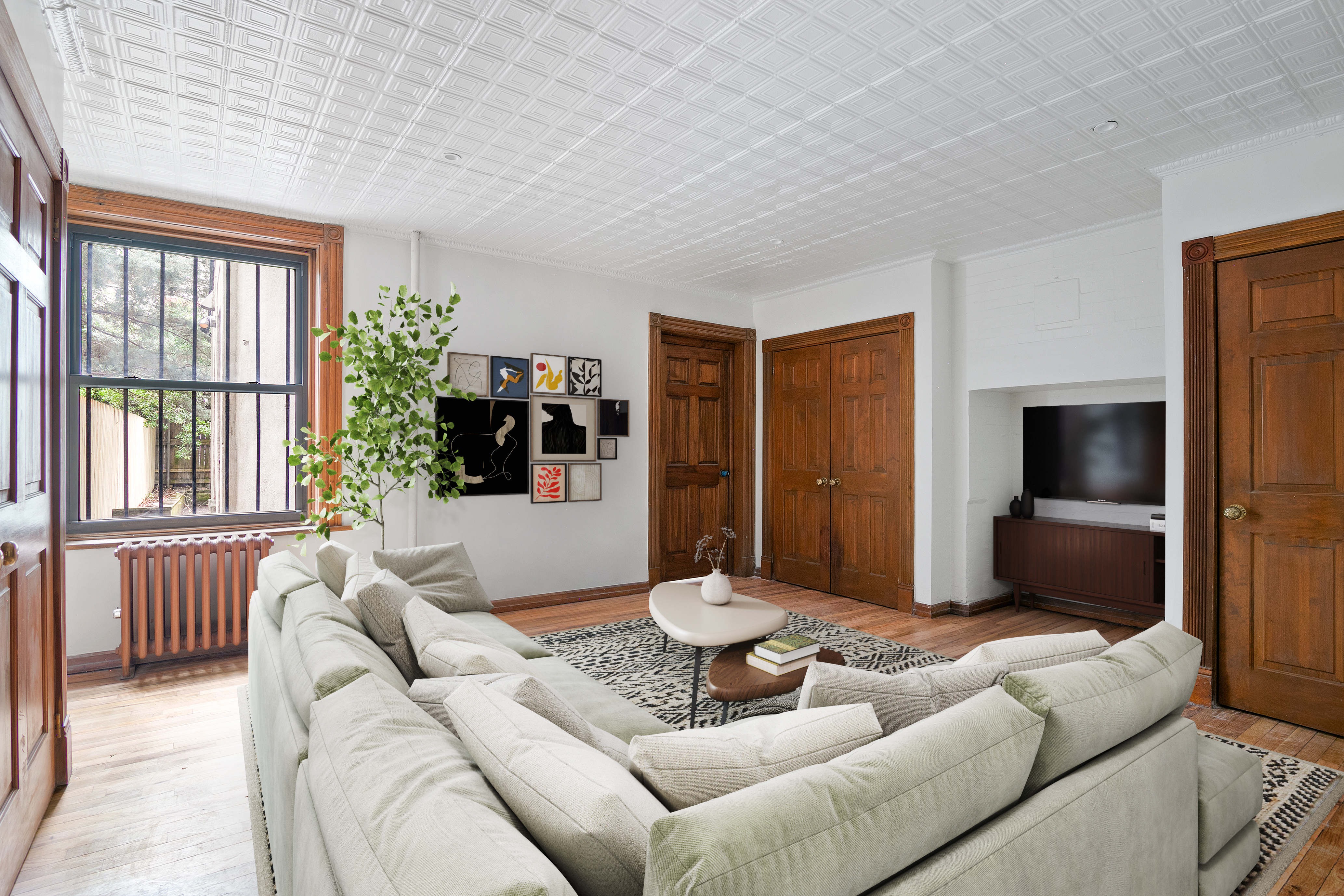 914 President Street, Unit TWNHSE Brooklyn, NY 11215 - Photo 13 of 29 a living room with furniture and a large window