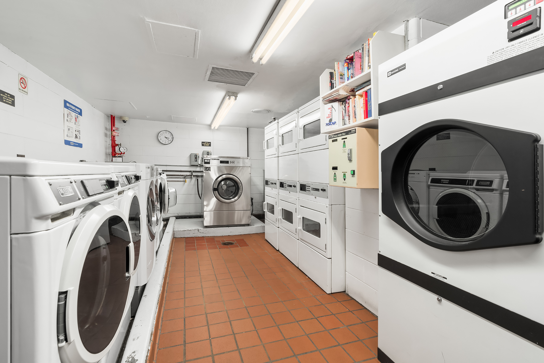 178 East 80th Street, Unit 3A Manhattan, NY 10075 - Photo 11 of 14 a utility room with dryer and washer