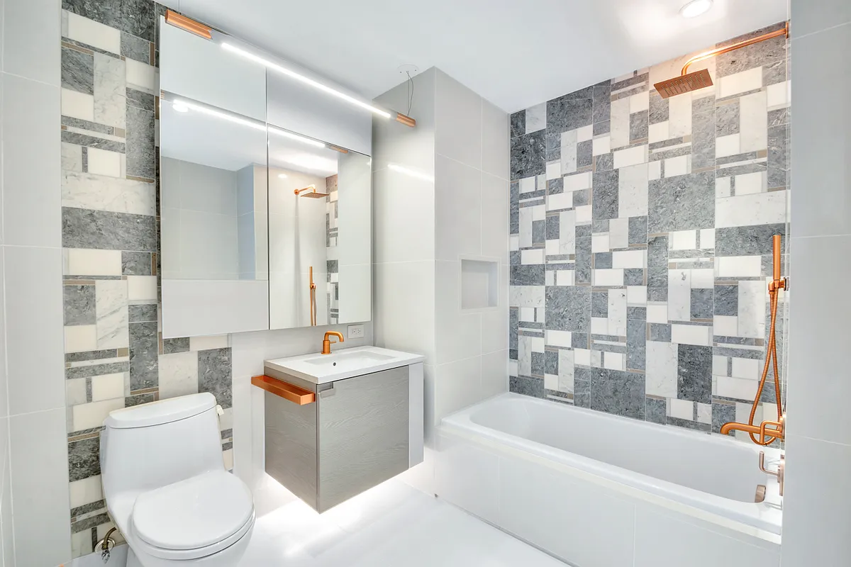 1 City Point, Unit 25L Brooklyn, NY 11201 - Photo 8 of 25 a bathroom with a sink toilet bathtub and shower