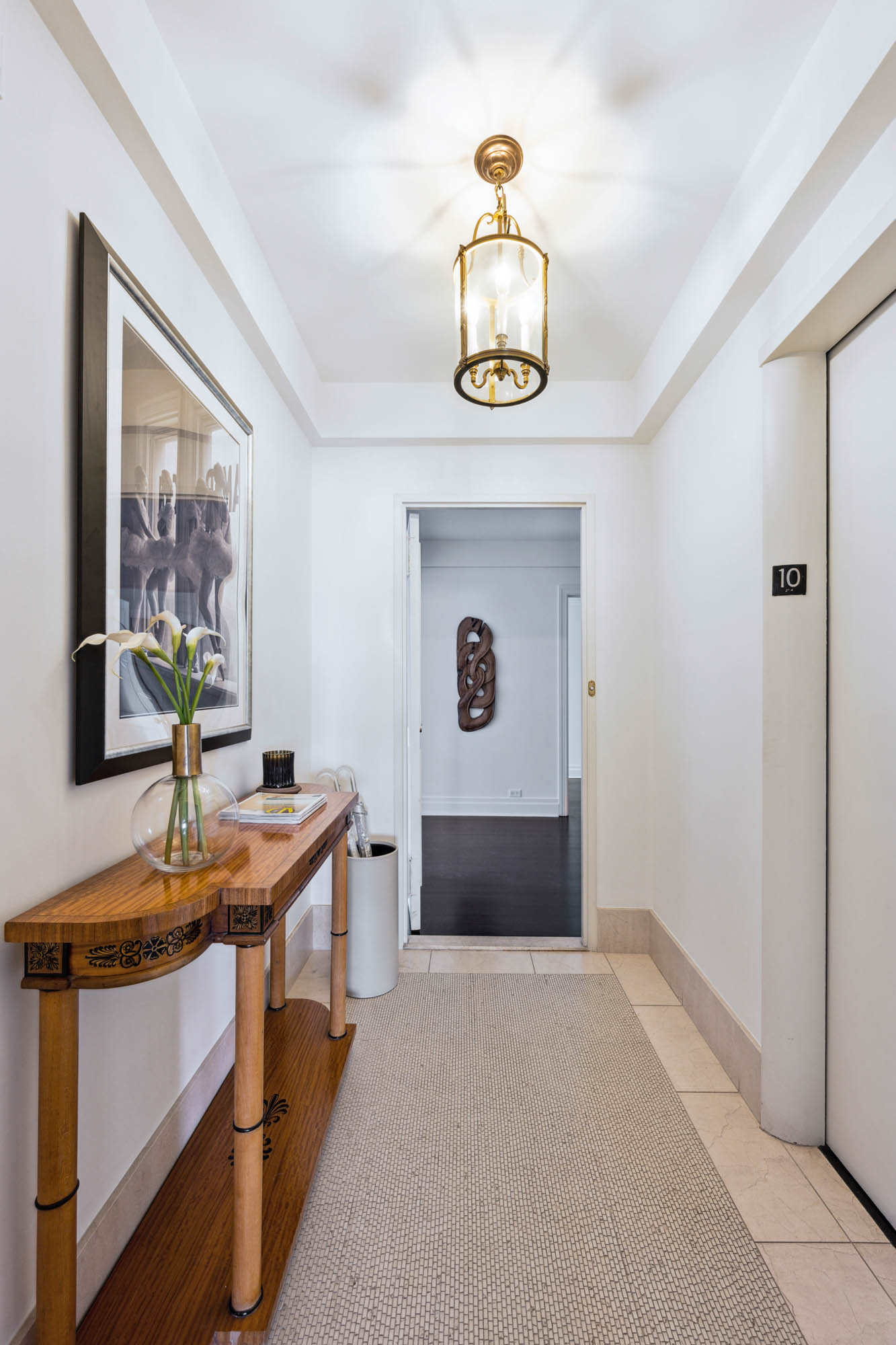 936 5th Avenue, Unit 10AB Manhattan, NY 10021 - Photo 19 of 37 a view of kitchen island with sink