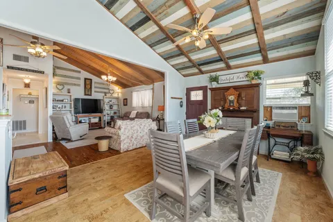 a view of a livingroom with furniture window and outside view