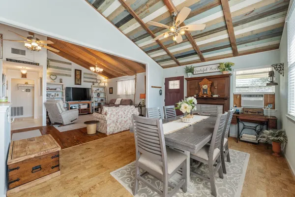 a view of a livingroom with furniture window and outside view