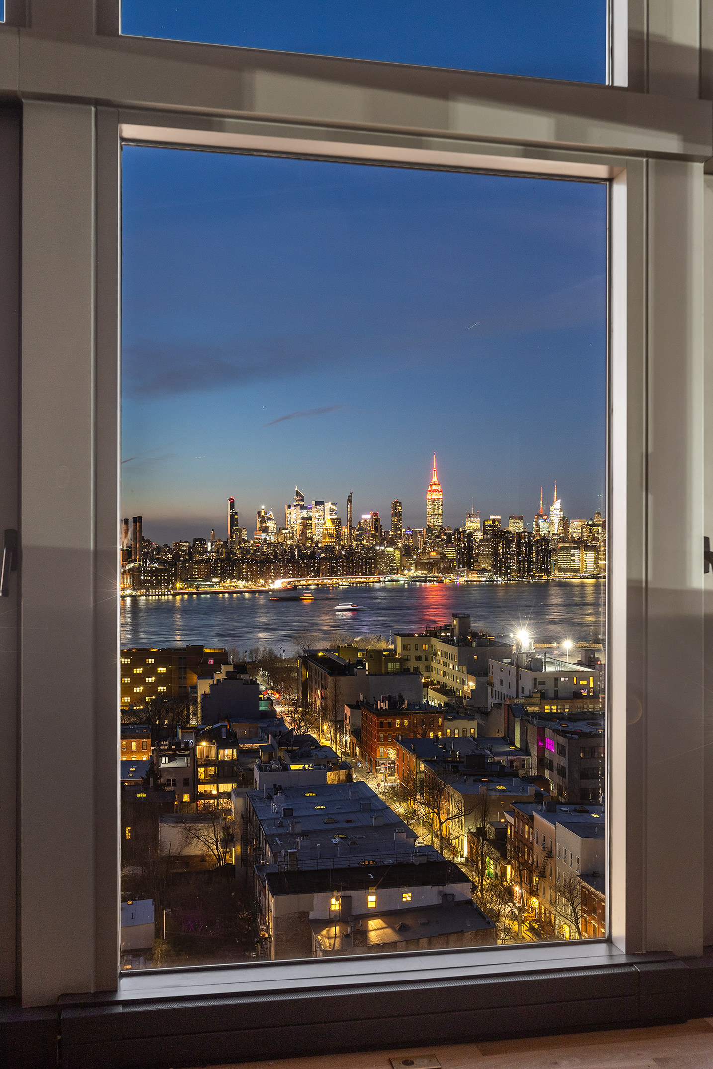 144 North 8th Street, Unit PH2 Brooklyn, NY 11249 - Photo 7 of 20 a view of a door of the house and car parked