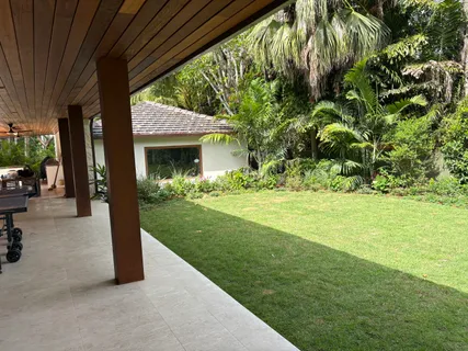 a view of a porch with a garden