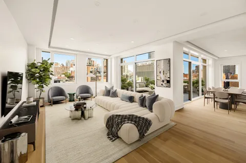 a living room with furniture or couch and a flat screen tv