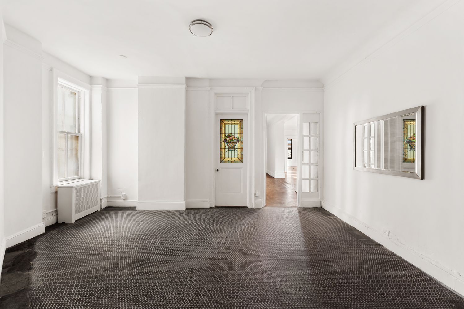 50 Central Park West, Unit 8BB Manhattan, NY 10023 - Photo 14 of 28 a view of an empty room with a window