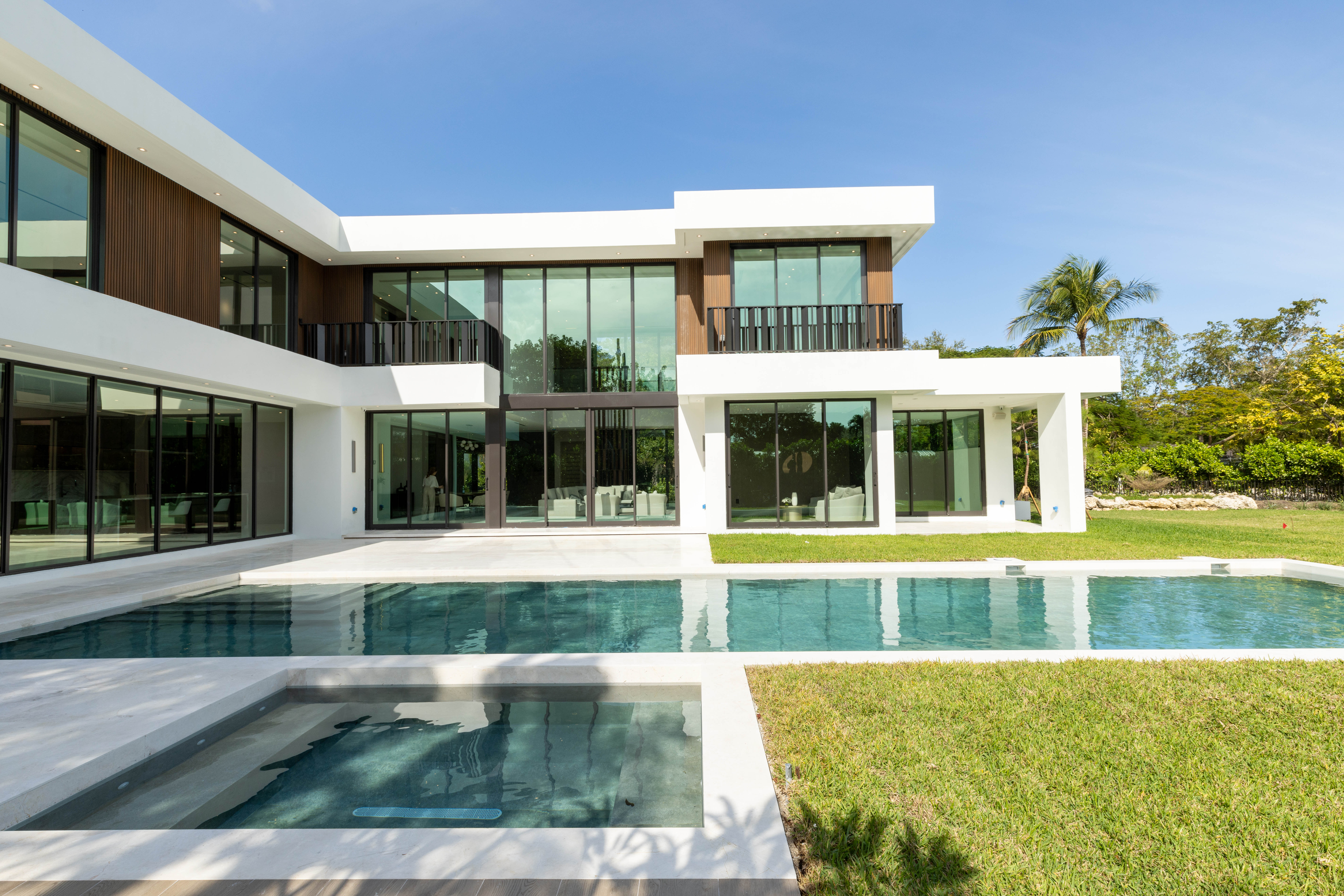 6920 Southwest 124th Street Pinecrest, FL 33156 - Photo 41 of 48 front view of a house with a yard