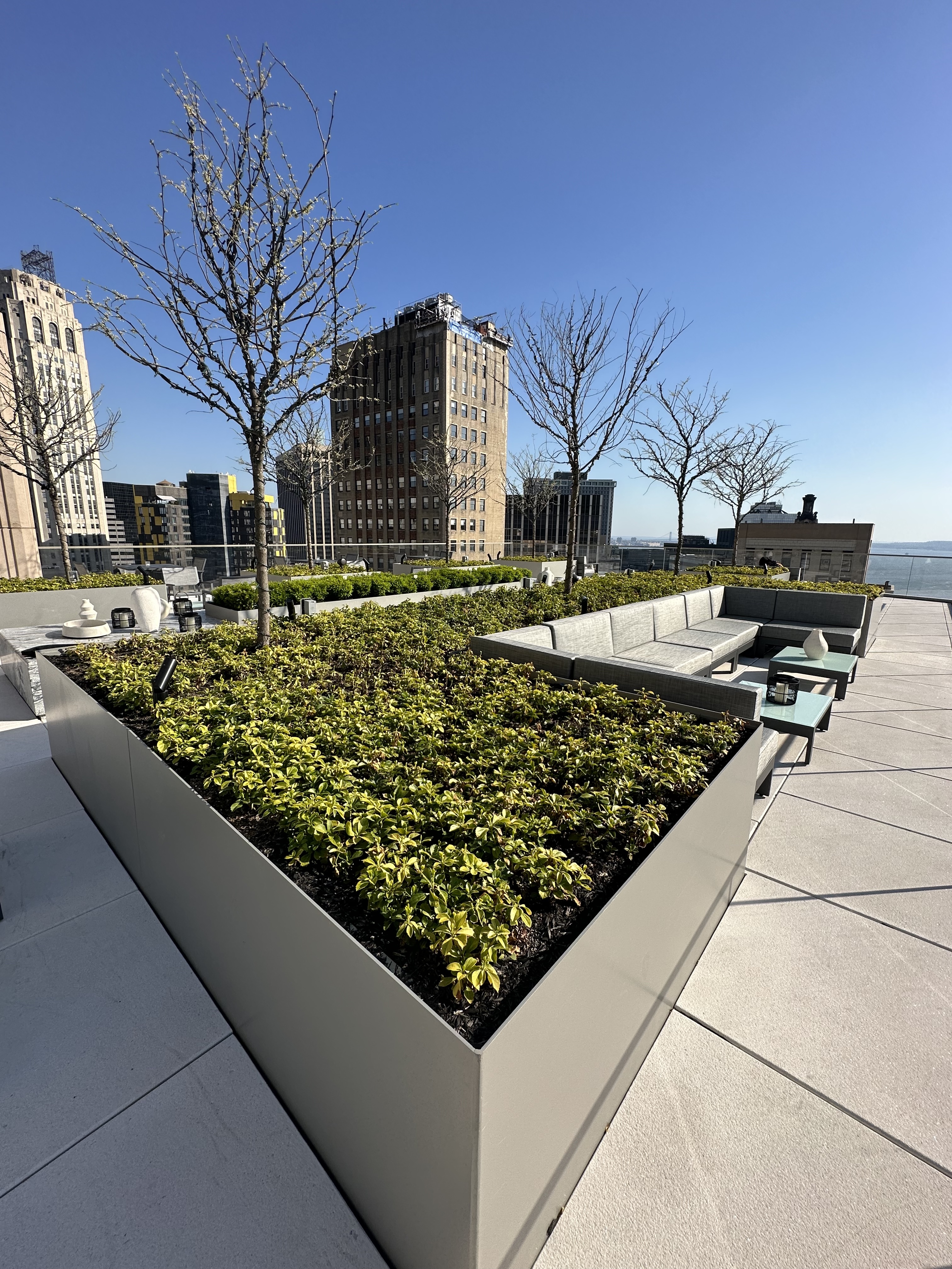 1 Wall Street, Unit 915 Manhattan, NY 10005 - Photo 12 of 18 a view of a couches with wooden fence