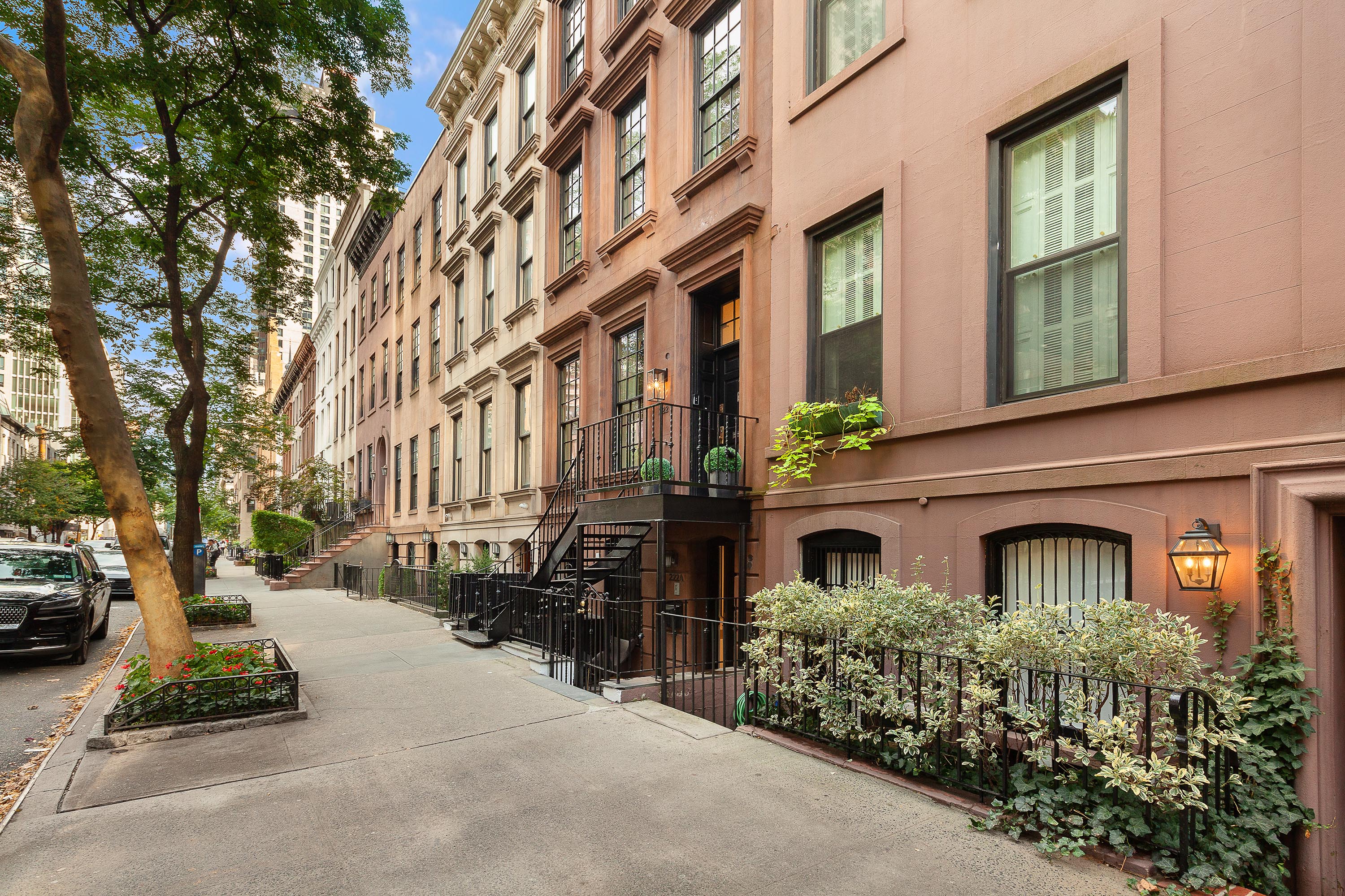 222 East 61st Street Manhattan, NY 10065 - Photo 29 of 30 a front view of a building with many windows