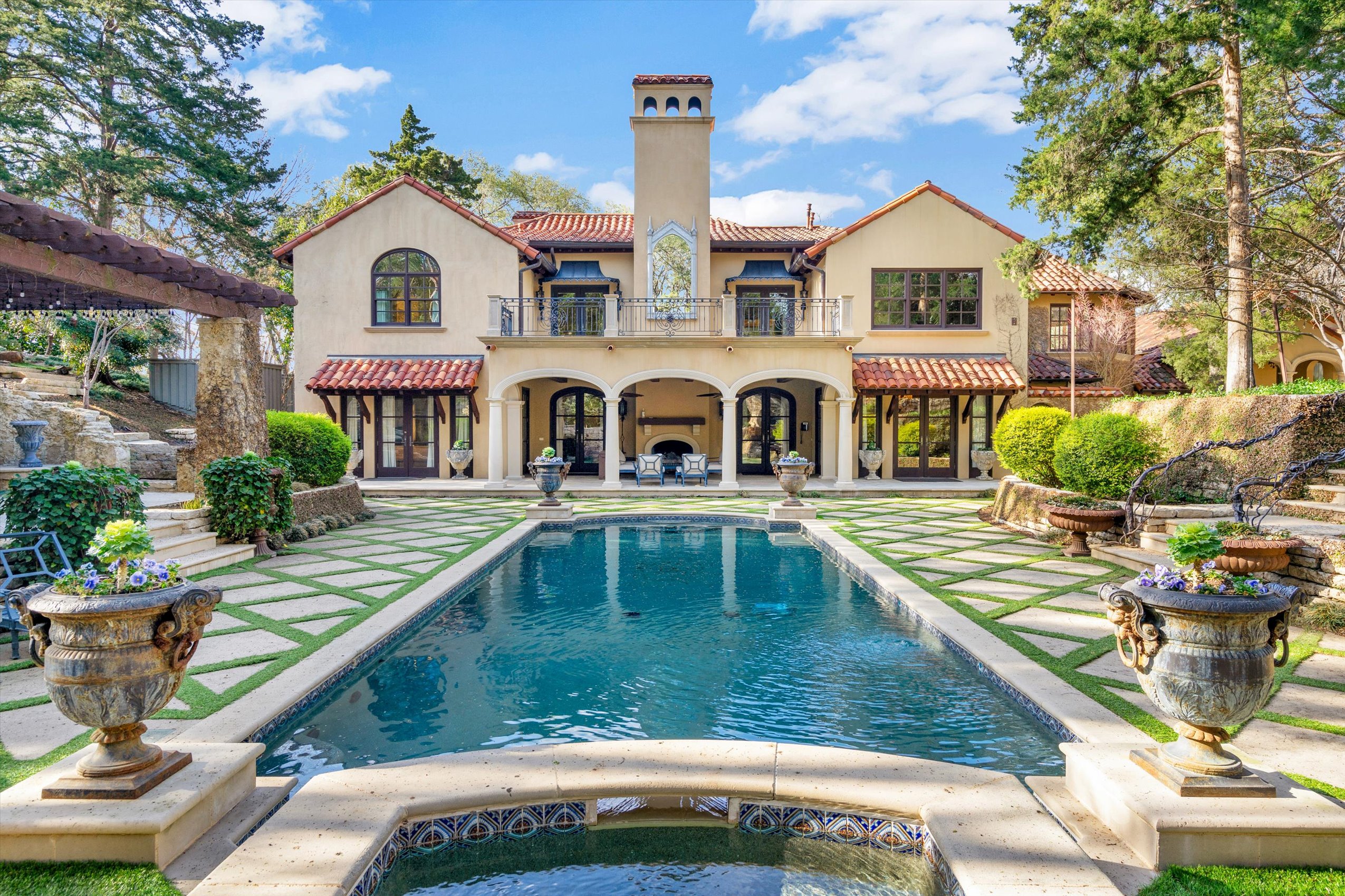 a view of a house with swimming pool