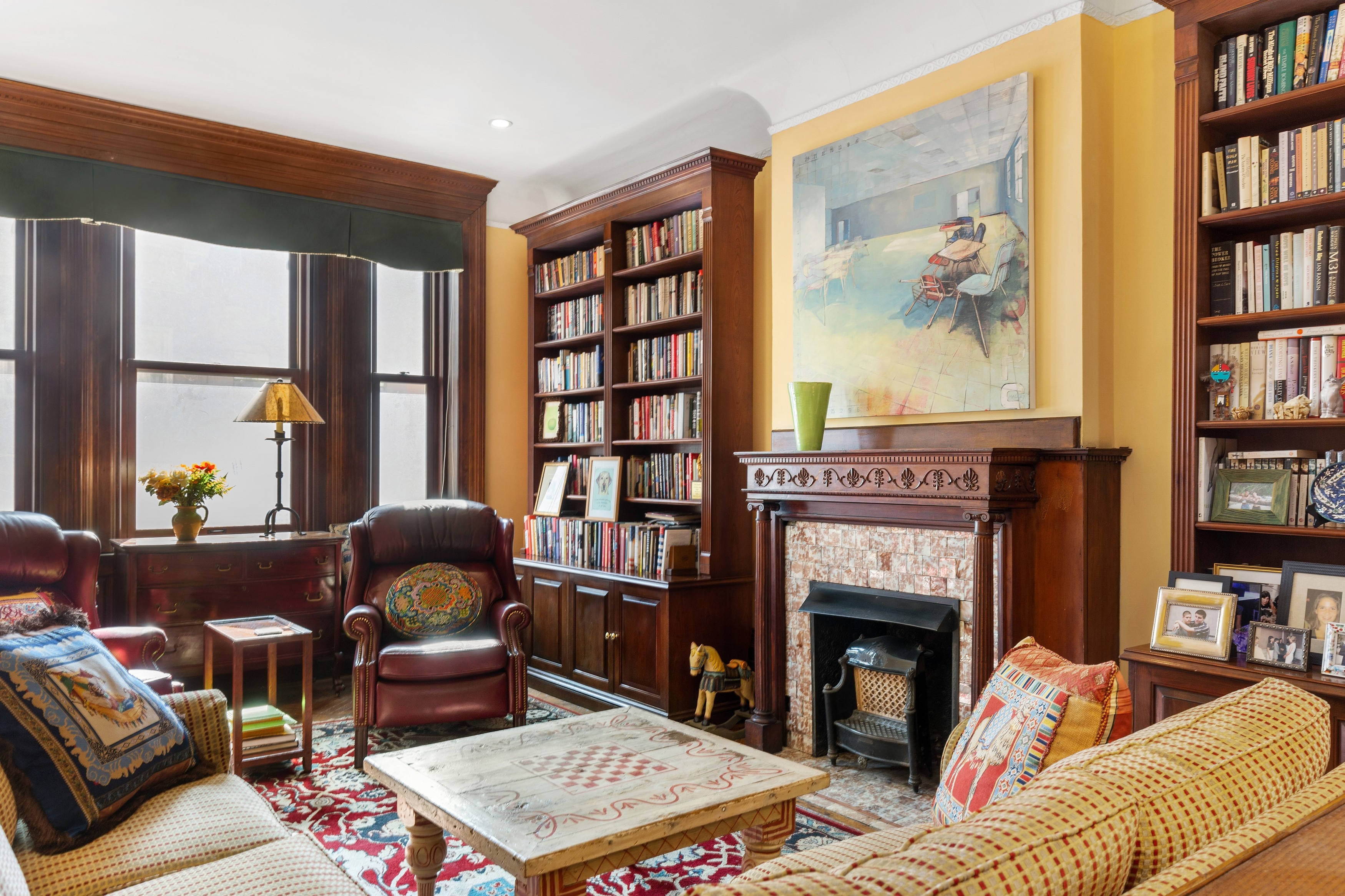 333 West 71st Street Manhattan, NY 10023 - Photo 14 of 29 a living room with furniture and a fireplace