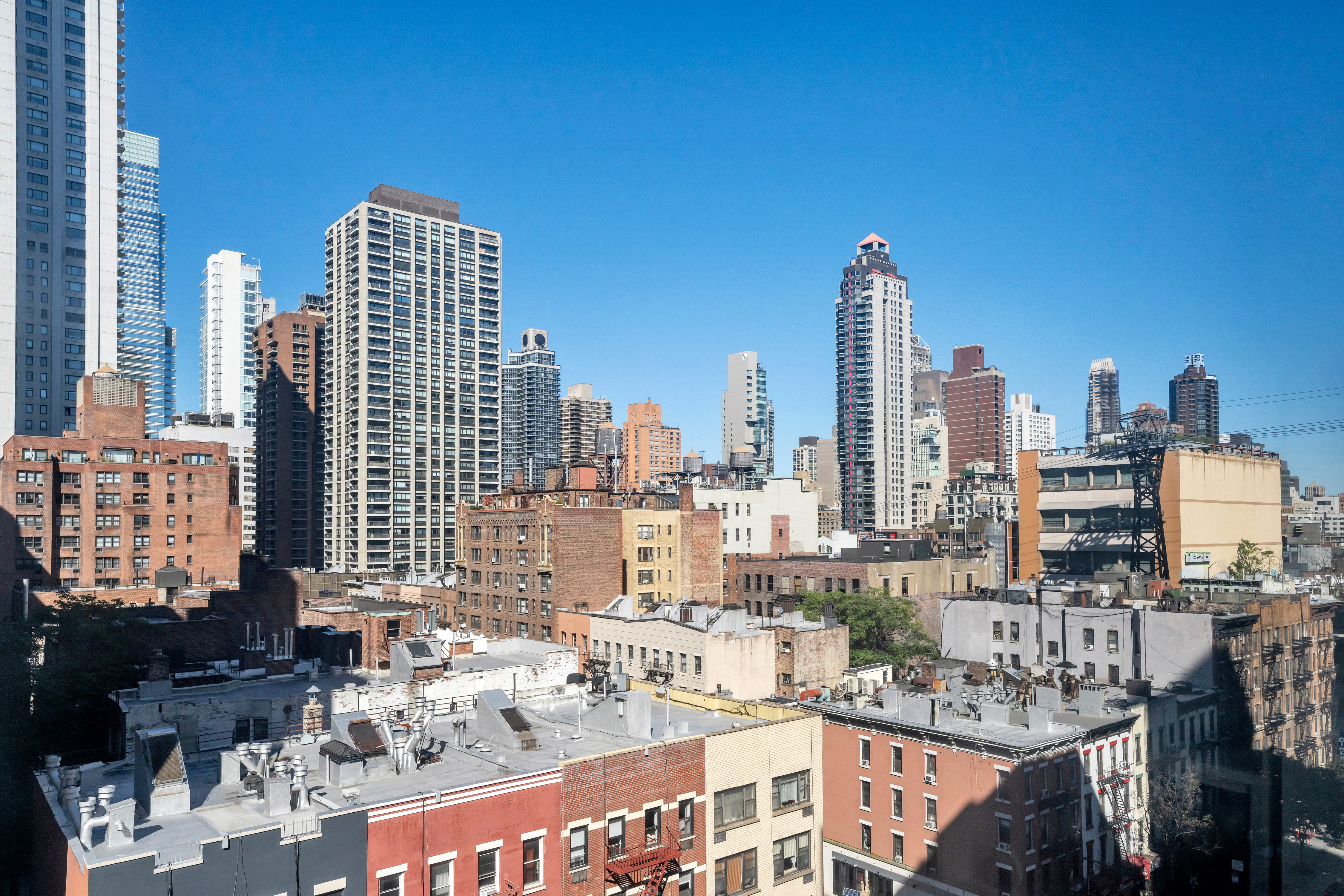 411 East 57th Street, Unit 11AB Manhattan, NY 10022 - Photo 15 of 17 a view of city with tall buildings