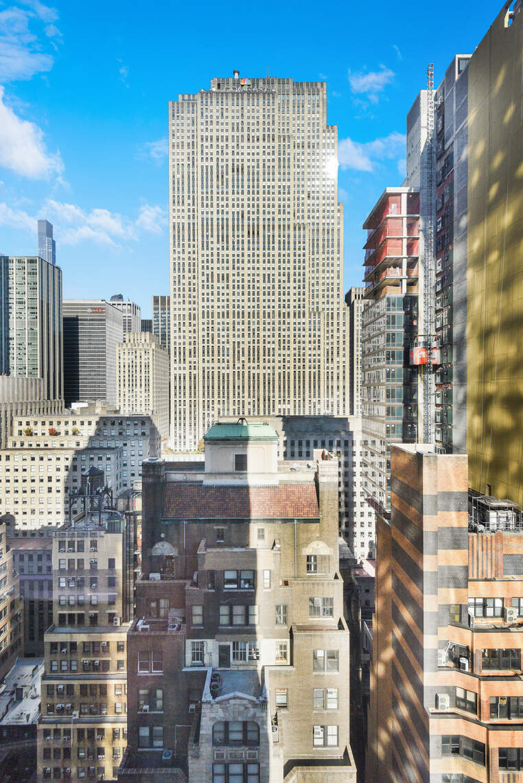 50 West 47th Street, Unit Undisclosed Manhattan, NY 10036 - Photo 3 of 27 a city view with tall buildings