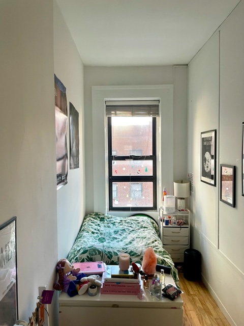 210 East 60th Street, Unit 4 Manhattan, NY 10022 - Photo 6 of 8 a bedroom with a bed window and a dresser