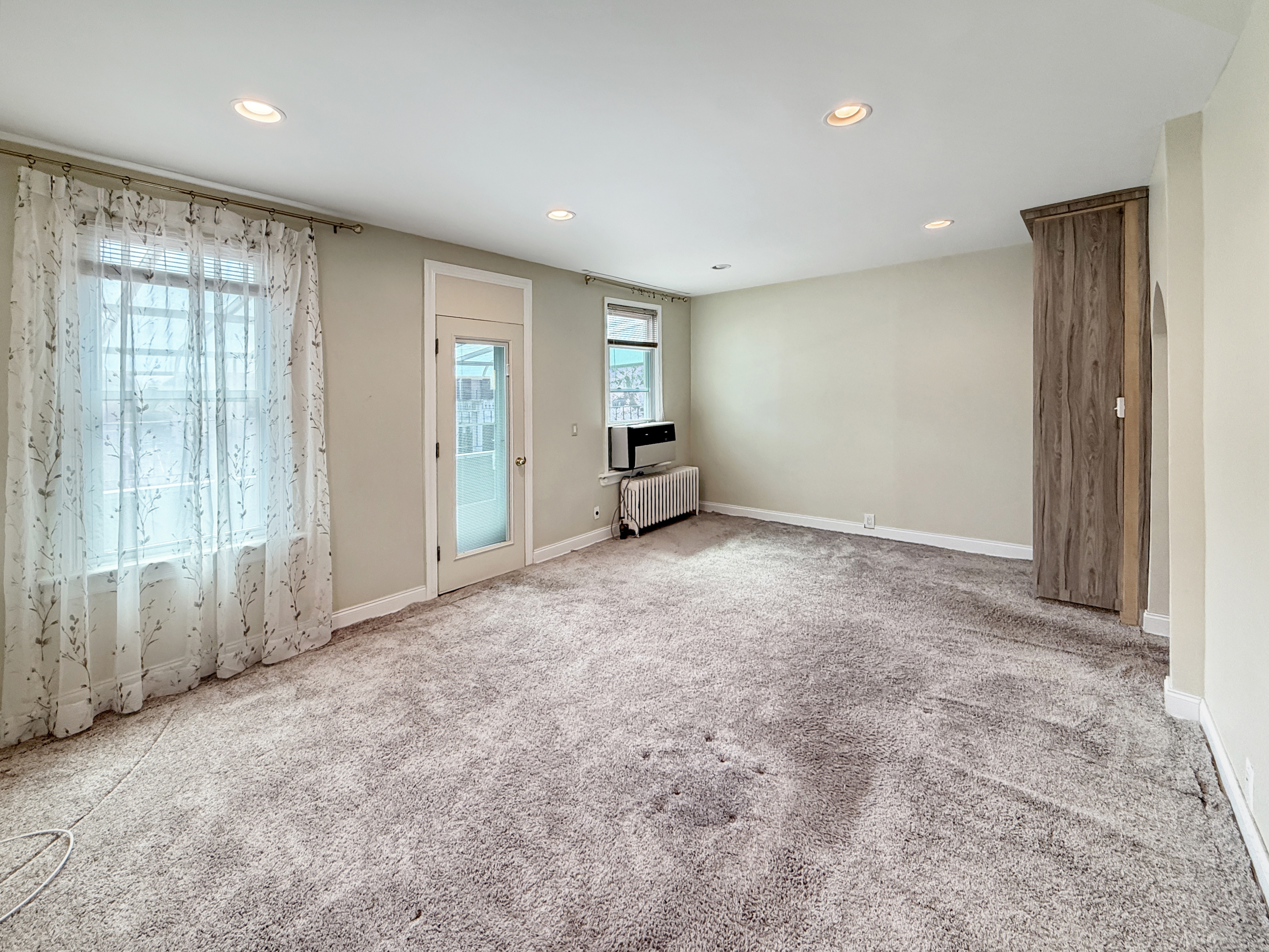 3735 Oceanic Avenue Brooklyn, NY 11224 - Photo 16 of 26 an empty room with windows