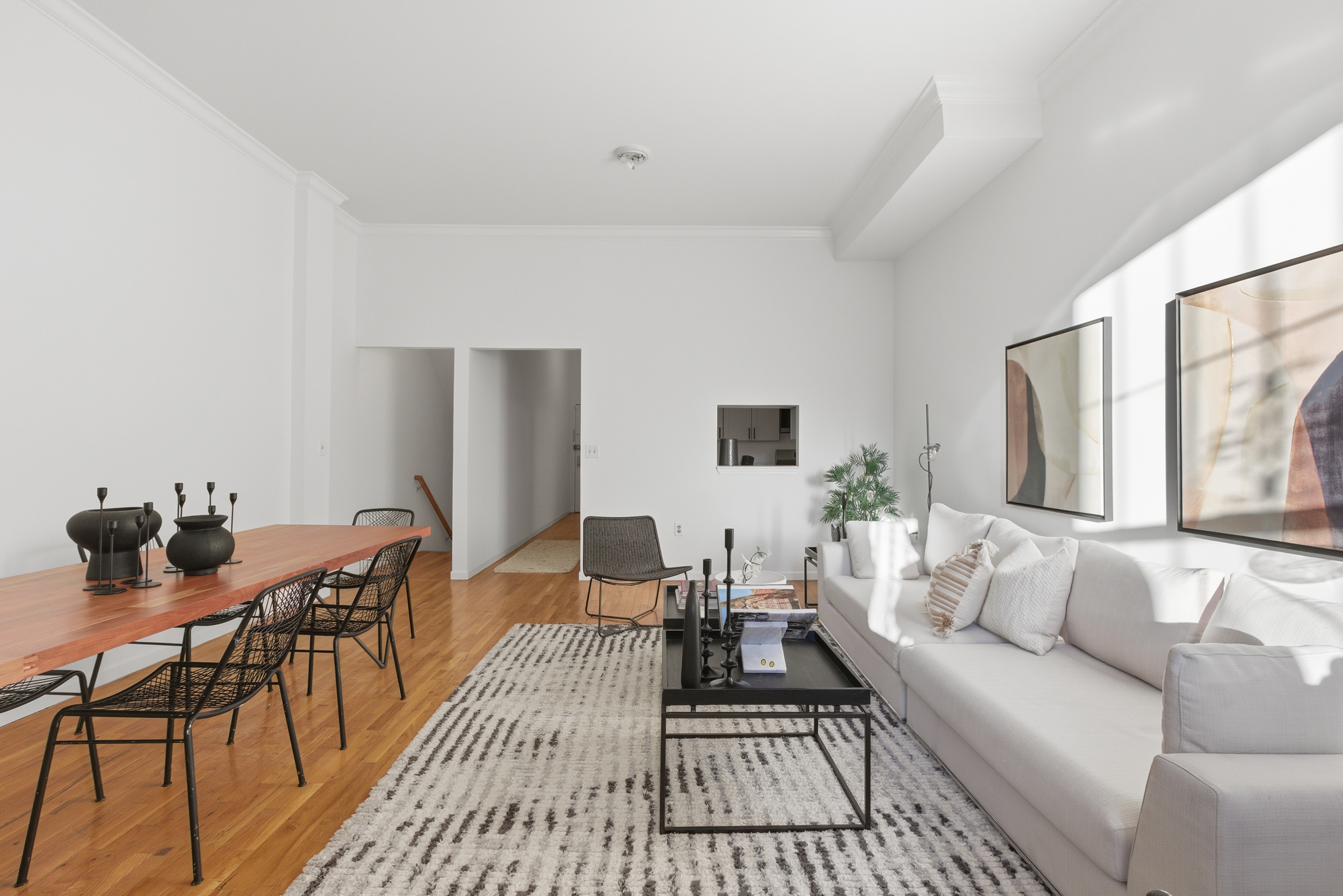 20 East 126th Street Manhattan, NY 10035 - Photo 3 of 19 a living room with furniture and a rug