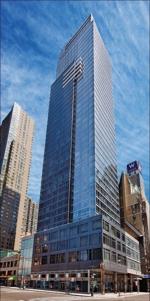 247 West 46th Street, Unit 2305 Manhattan, NY 10036 - Photo 12 of 13 a front view of a building